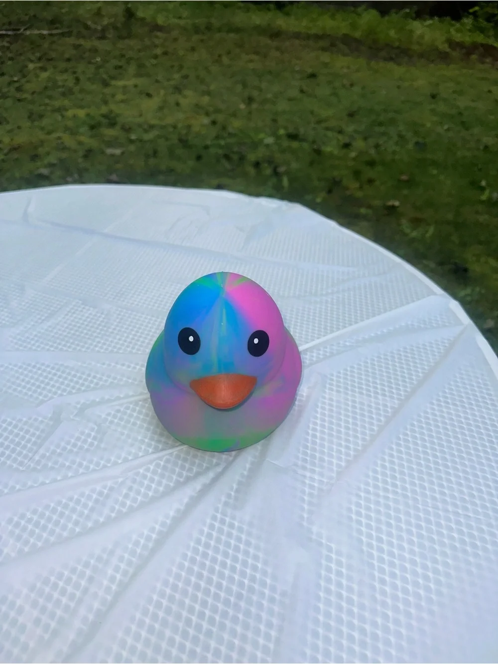 ONE Sunny Days Squeeezy tiedye duck jumbo squishy squeezy fidget toy multicolor